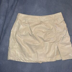 Tan leather mini skirt
